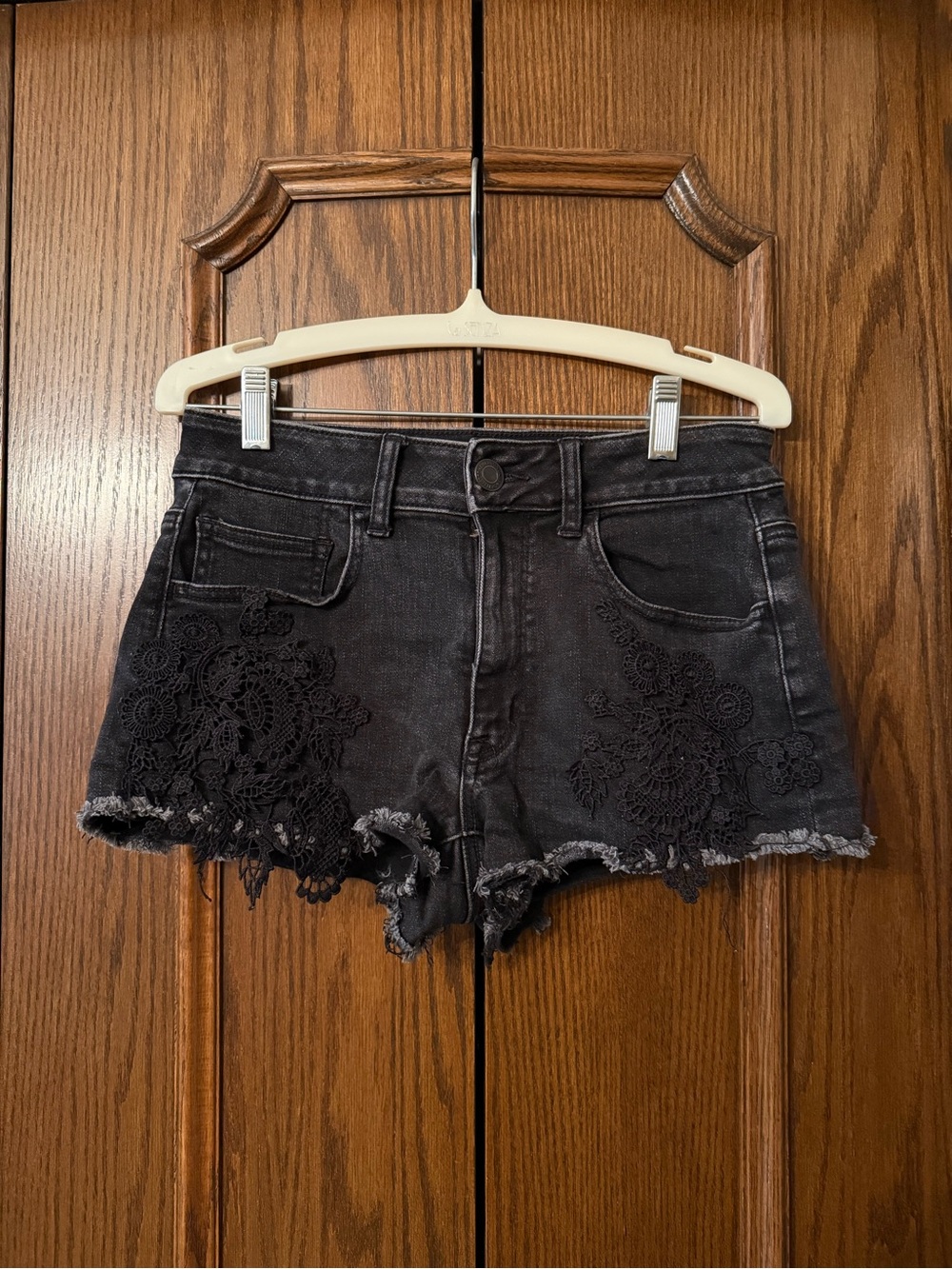 American Eagle Outfitters Black Denim Shorts with Lace Appliqué